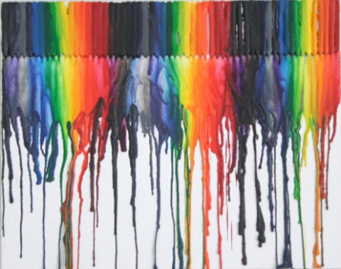 Picture of crayons melted on a canvas