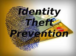 picture of a fingerprint superimposed over credit cards with the words identity theft protection