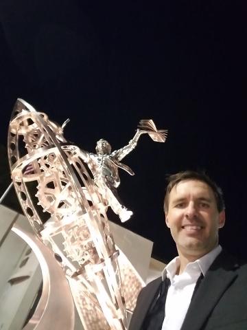 speaker Ty Rohrer with Ray Bradbury statue in Waukegan