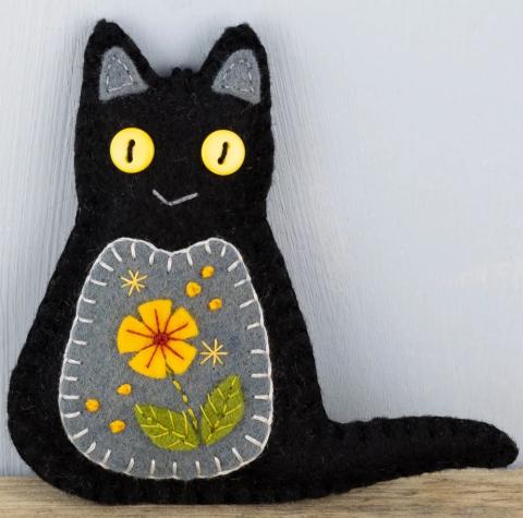 black cat made out of felt, a craft