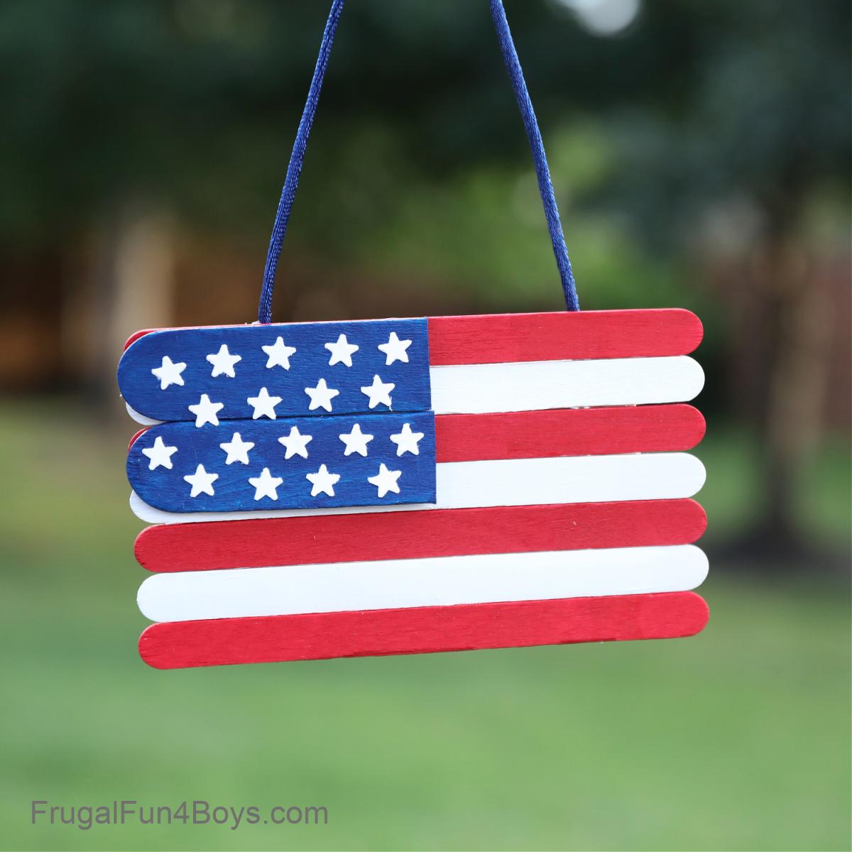 American flag made out of popsicle sticks painted red white and blue