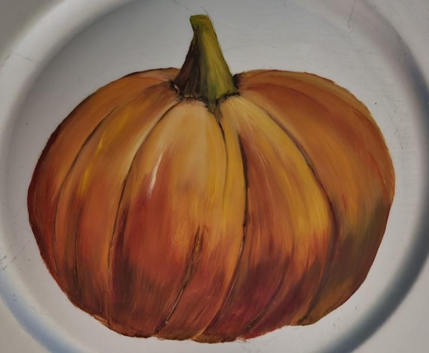 a painting of an orange pumpkin