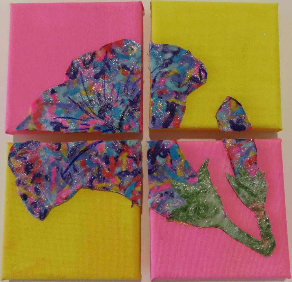 acrylic yarn melted together and cut into a flower shape